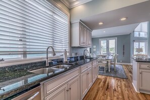 Fridge, coffee/tea maker, ice maker, dining tables