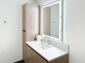 Hair dryer, towels, soap, shampoo