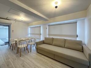 Exclusive Apartment | Living area | TV - Mitao 604 (Hiroshima)