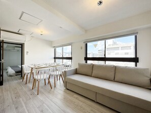 Exclusive-Apartment | Wohnbereich | Fernseher