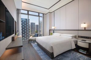 Premium bedding, down comforters, in-room safe, desk