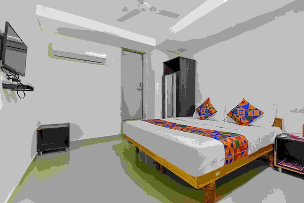 Egyptian cotton sheets, premium bedding, in-room safe, free WiFi - FabExpress Himalaya Inn - Inside Himalaya Mall (Ahmedabad)