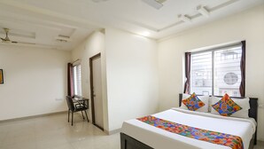 Deluxe Room | Egyptian cotton sheets, premium bedding, in-room safe, WiFi (free) - Fabhotel Hrg Destiny (Nagpur)