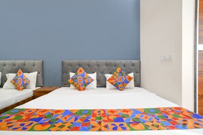 Egyptian cotton sheets, premium bedding, in-room safe, free WiFi - Fabexpress Tirupati (Ujjain)