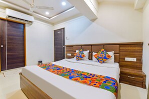 Egyptian cotton sheets, premium bedding, in-room safe, soundproofing - Fabexpress Radhe Residency (Ahmedabad)