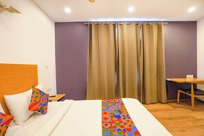 Egyptian cotton sheets, premium bedding, in-room safe, soundproofing - Fabhotel Ramayana (Lucknow)
