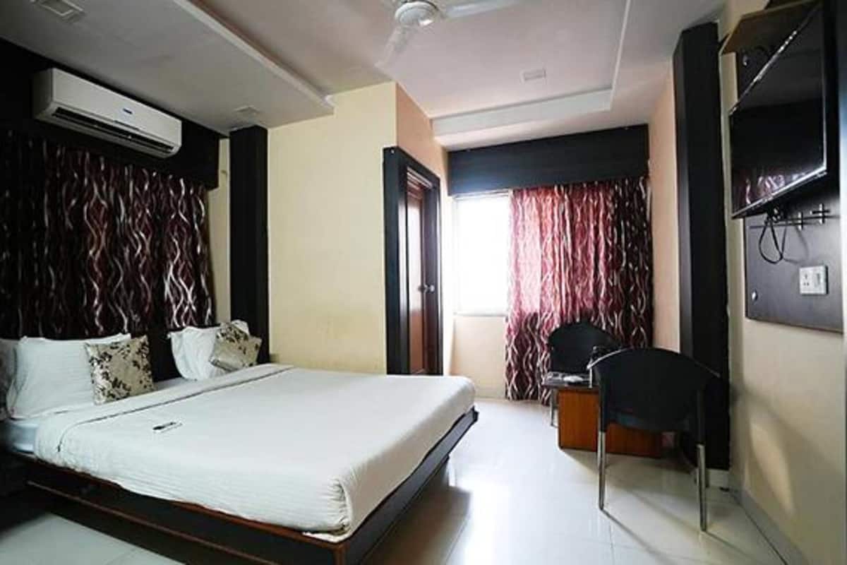Deluxe kamer | Lakens van Egyptisch katoen, luxe beddengoed, een kluis op de kamer