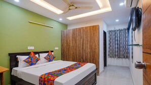 Premium Room | Egyptian cotton sheets, premium bedding, in-room safe, WiFi (free) - Fabhotel Cozy (Hyderabad)