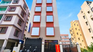 A multi-story hotel with a modern facade, featuring a prominent sign for 'Fab Hotels'. - Fabhotel The Sunshine Residency (Barasat)