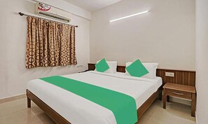 华丽客房 | 埃及棉床单、高档床上用品、客房内保险箱、免费 WiFi