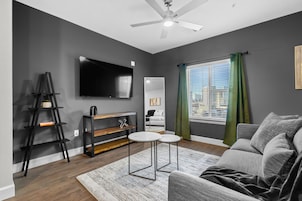 Luxury Apartment | Living area | 65-inch LCD TV with digital channels, Netflix, Hulu