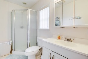 Shower, hair dryer, towels, soap