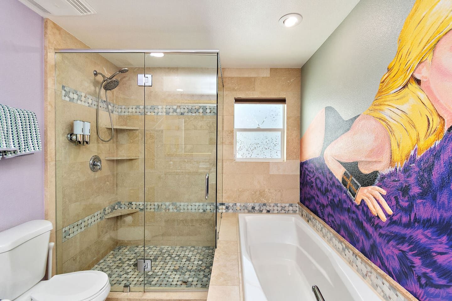 A bathroom with a glass-enclosed shower, a white bathtub, and a tiled floor.