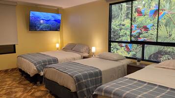 Standard Quadruple Room, Mixed Dorm, Private Bathroom, Courtyard View | Individually furnished, laptop workspace, blackout drapes, soundproofing