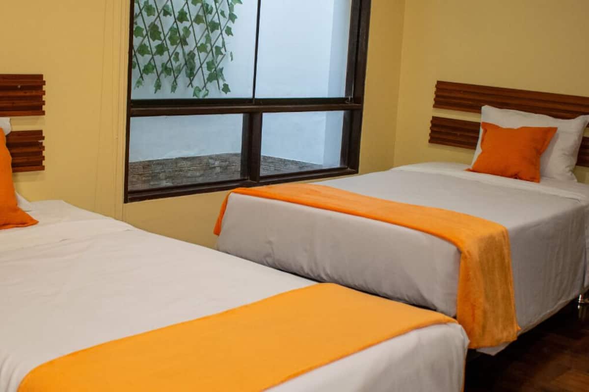 Classic Double or Twin Room, Mixed Dorm, Non Smoking, Private Bathroom | 1 bedroom, individually furnished, laptop workspace, blackout curtains