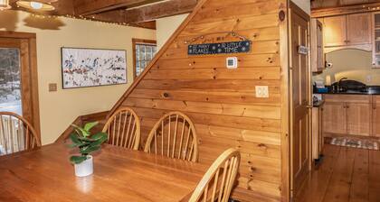 The Whimsical Chalet is a lovely cape on acres. Private setting less than 10 minutes to skiing.