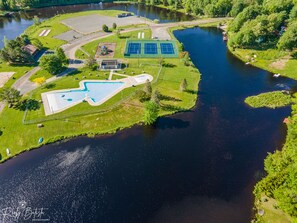 A heated pool - Family Friendly Cozy Lake Front Home Newly Constructed With All the Amenities! (Pocono Lake)
