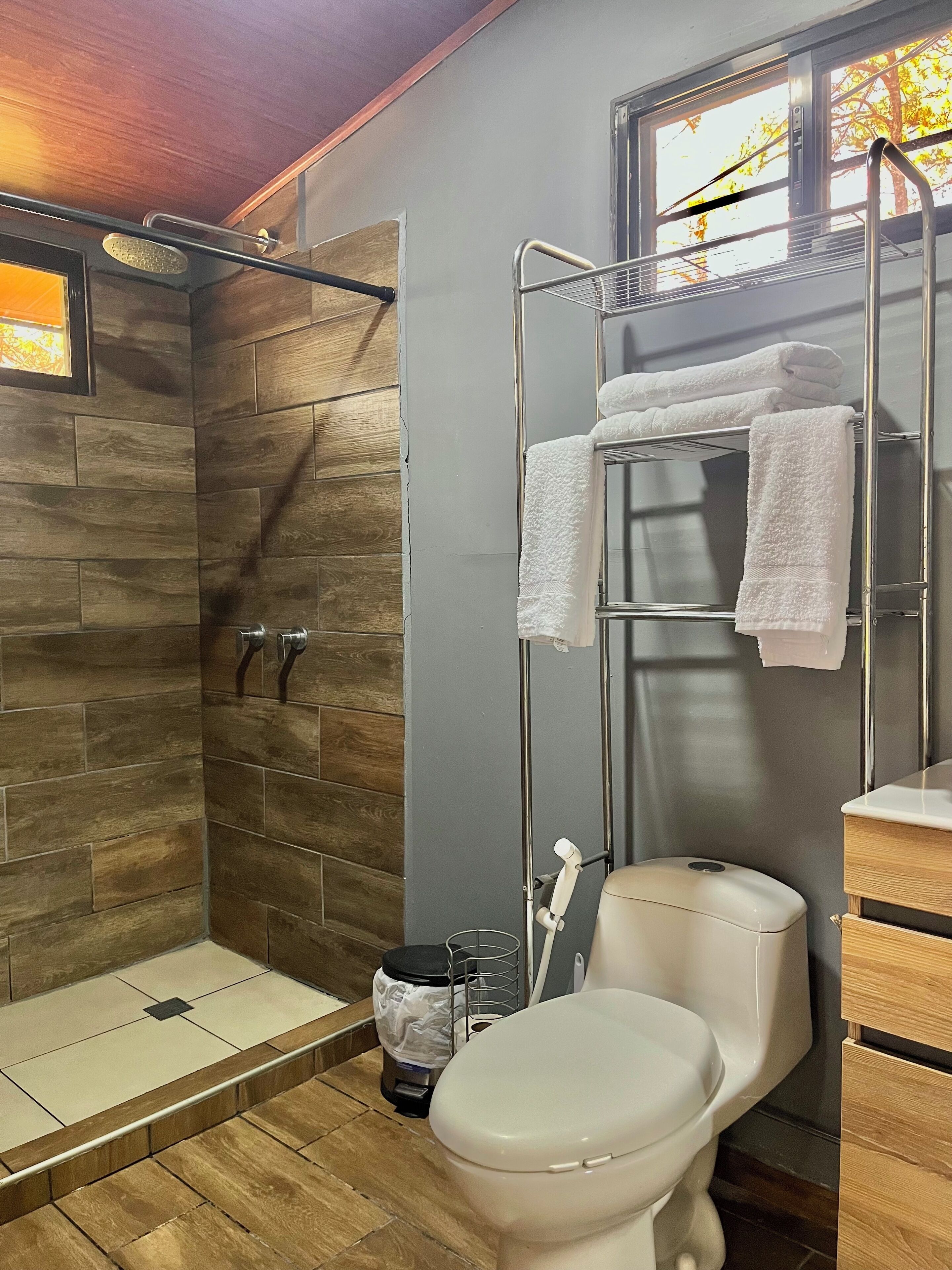 Family Cabin | Bathroom | Shower, free toiletries, towels, soap