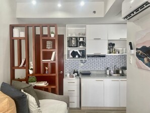 Fridge, microwave, oven, stovetop - Mesavirre Bacolod | Elegantly Furnished 1BDM w/ Balcony @ LOPEZ LUX. (Bacolod)