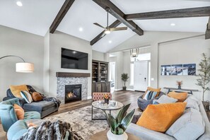Smart TV, fireplace, table football, books
