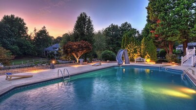 Lakefront Home w Pool, Dock, Fire Pit & Game Room Sip, Sip Away by Avantstay