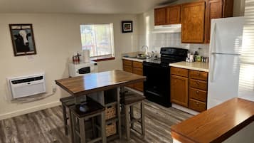 Fridge, microwave, coffee/tea maker, dining tables