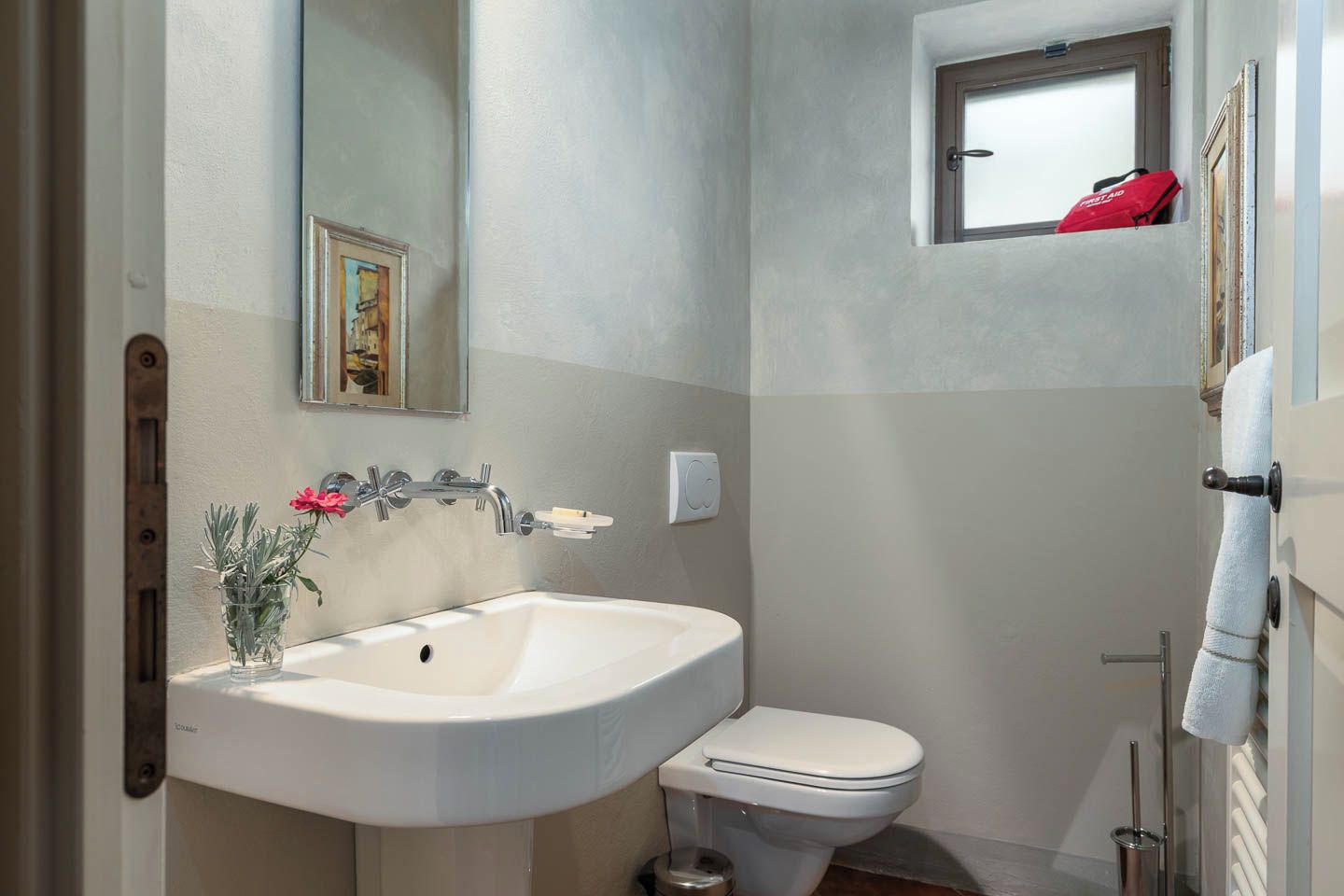 Le Rose's half bath with Duravit fixtures (and first aid kit). 