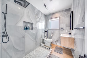 Shower, hair dryer, towels, soap
