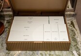 A box of Regent personal care items including a shaving kit, toothbrushes, and a cologne set.