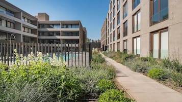 Loft, varias habitaciones, patio, vista a la alberca | Áreas de la propiedad