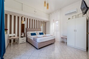 1 chambre, fer et planche Ă repasser, Wi-Fi, draps fournis