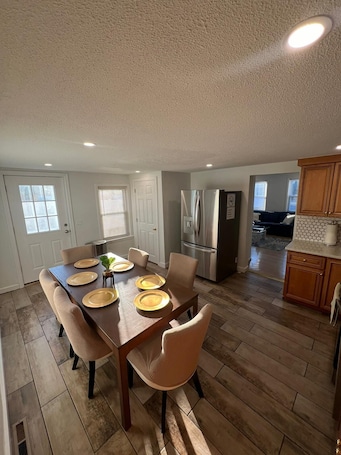 Dining. Relax with family or friends to this elegant apartment in the heart of Waltham
