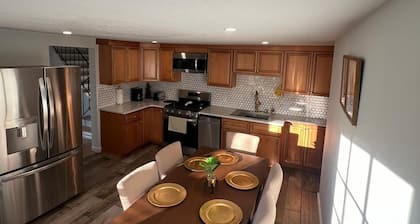 Relax with family or friends to this elegant apartment in the heart of Waltham