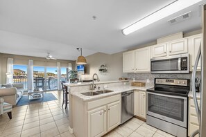 Fridge, microwave, oven, stovetop - Pensacola Beach Waterfront | Beach N' Bay | Paddleboards, Bikes & More | My Beach Getaways (Pensacola Beach)