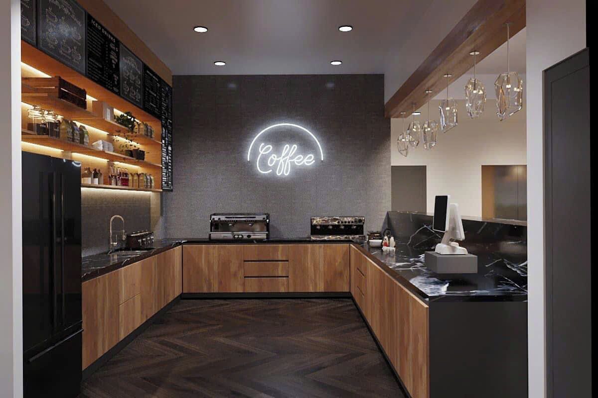 A modern coffee shop interior with wooden cabinetry, a neon sign, and pendant lighting.