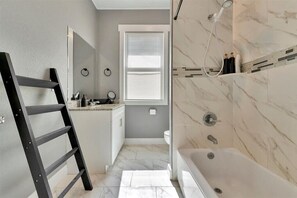 Hair dryer, towels, soap, shampoo