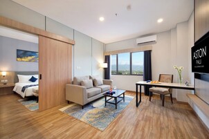 Suite junior (Junior) | 1 dormitorio, caja fuerte, escritorio y sistema de insonorización