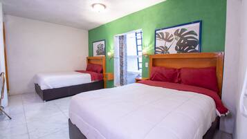 Habitación familiar | Ropa de cama de alta calidad, edredón, wifi gratis y muebles diferentes