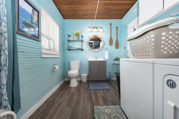 Shower, hair dryer, towels