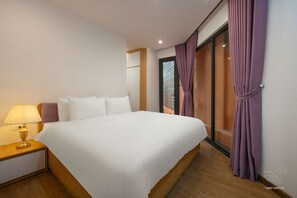 ห้องดีลักซ์ดับเบิล, เตียงคิงไซส์ 1 เตียง, ระเบียง, ติดสวน | วิวจากห้องพัก