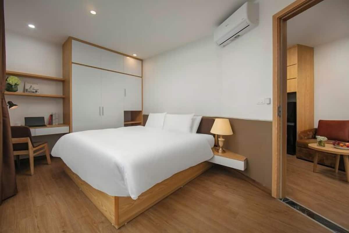 Minibar, desk, laptop workspace, blackout curtains