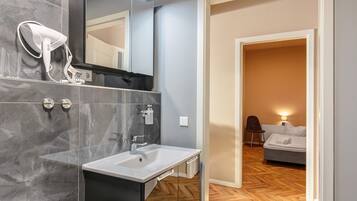 Shower, hair dryer, towels