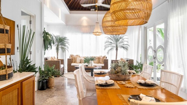 A spacious dining area with a wooden table, wicker chairs, and a ceiling fan. - Beautiful 6BR Villa W/Pool & Spa room, Bali villa 2238 (Bali)