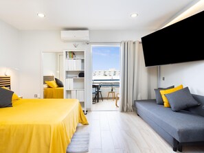 1 dormitorio, tabla de planchar con plancha, Internet y ropa de cama