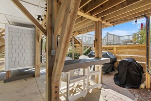 Outdoor dining - "The Beach House" is an Oceanfront 6 Bedroom, 6 Bathroom Home! (Holden Beach)