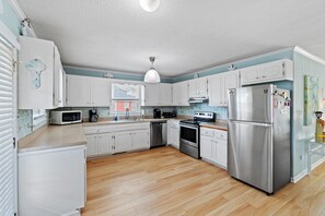 Fridge, microwave, oven, dishwasher - "Flip, Flop and Fly" 3 Bedroom Canal Home, PET FRIENDLY and Private Hot Tub (Holden Beach)