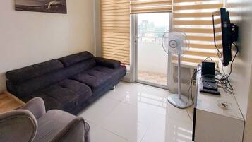 Departamento familiar | 1 habitación, escritorio y espacio para trabajar con laptop