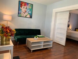 Exclusive Suite | Living area | Flat-screen TV