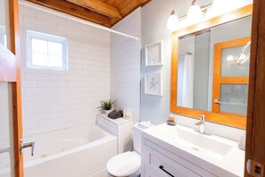 Hair dryer, towels, soap, shampoo