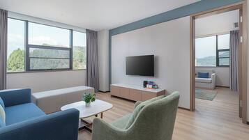 Premium bedding, down duvets, in-room safe, desk